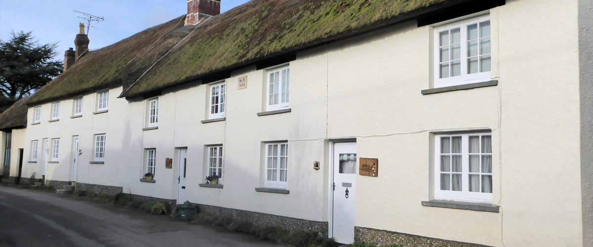 Row of thatched cottages